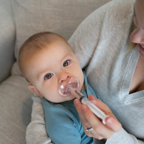 Dr. Brown's Pacidose Pacifier and Liquid Baby Medicine Dispenser with Oral Syringe and Two Sizes of Pacifier Bulbs - 0-6m and 6-18m